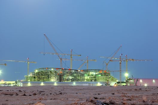 Construction of a new stadium in the desert of Qatar, Middle East Construction of a new stadium in the desert of Qatar, Middle East