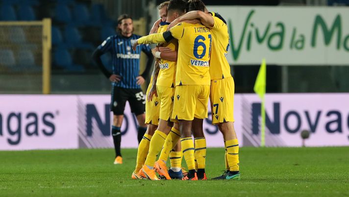 BERGAMO, ITALY - NOVEMBER 28: Mattia Zaccagni of Hellas Verona F.C. (obscured) celebrates with teammates after scoring their team's second goal during the Serie A match between Atalanta BC and Hellas Verona FC at Gewiss Stadium on November 28, 2020 in Bergamo, Italy. Football Stadiums around Europe remain empty due to the Coronavirus Pandemic as Government social distancing laws prohibit fans inside venues resulting in fixtures being played behind closed doors. (Photo by Emilio Andreoli/Getty Images) BERGAMO, ITALY - NOVEMBER 28: Mattia Zaccagni of Hellas Verona F.C. (obscured) celebrates with teammates after scoring their team's second goal during the Serie A match between Atalanta BC and Hellas Verona FC at Gewiss Stadium on November 28, 2020 in Bergamo, Italy. Football Stadiums around Europe remain empty due to the Coronavirus Pandemic as Government social distancing laws prohibit fans inside venues resulting in fixtures being played behind closed doors. (Photo by Emilio Andreoli/Getty Images)