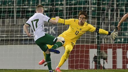 TALLAGHT, IRELAND - NOVEMBER 12: Ross Tierney of Republic of Ireland sees his shot saved by Marco Carnesecchi of Italy during the UEFA European U21 Championship Qualifier between Republic of Ireland and Italy at Tallaght Stadium on November 12, 2021 in Tallaght, Ireland. (Photo by Charles McQuillan/Getty Images) TALLAGHT, IRELAND - NOVEMBER 12: Ross Tierney of Republic of Ireland sees his shot saved by Marco Carnesecchi of Italy during the UEFA European U21 Championship Qualifier between Republic of Ireland and Italy at Tallaght Stadium on November 12, 2021 in Tallaght, Ireland. (Photo by Charles McQuillan/Getty Images)