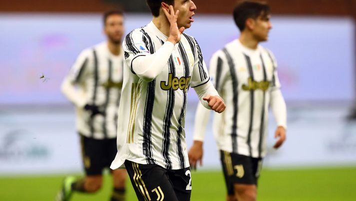 MILAN, ITALY - JANUARY 06: Federico Chiesa of Juventus F.C. celebrates after scoring their team's second goal during the Serie A match between AC Milan and Juventus at Stadio Giuseppe Meazza on January 06, 2021 in Milan, Italy. Sporting stadiums around Italy remain under strict restrictions due to the Coronavirus Pandemic as Government social distancing laws prohibit fans inside venues resulting in games being played behind closed doors. (Photo by Marco Luzzani/Getty Images) MILAN, ITALY - JANUARY 06: Federico Chiesa of Juventus F.C. celebrates after scoring their team's second goal during the Serie A match between AC Milan and Juventus at Stadio Giuseppe Meazza on January 06, 2021 in Milan, Italy. Sporting stadiums around Italy remain under strict restrictions due to the Coronavirus Pandemic as Government social distancing laws prohibit fans inside venues resulting in games being played behind closed doors. (Photo by Marco Luzzani/Getty Images)