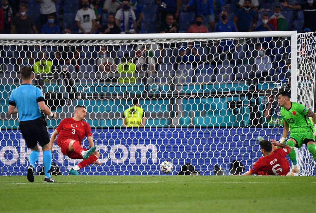  ROME, ITALY - JUNE 11: Merih Demiral of Turkey scores an own goal for Italy's first goal during the UEFA Euro 2020 Championship Group A match between Turkey and Italy at the Stadio Olimpico on June 11, 2021 in Rome, Italy. (Photo by Filippo Monteforte - Pool/Getty Images) 