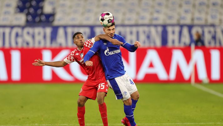 GELSENKIRCHEN, GERMANY - MARCH 05: Leandro Barreiro of 1.FSV Mainz 05 battles for possession with Kerim Calhanoglu of FC Schalke 04 during the Bundesliga match between FC Schalke 04 and 1. FSV Mainz 05 at Veltins-Arena on March 05, 2021 in Gelsenkirchen, Germany. Sporting stadiums around Germany remain under strict restrictions due to the Coronavirus Pandemic as Government social distancing laws prohibit fans inside venues resulting in games being played behind closed doors. (Friedemann Vogel - Pool/Getty Images) GELSENKIRCHEN, GERMANY - MARCH 05: Leandro Barreiro of 1.FSV Mainz 05 battles for possession with Kerim Calhanoglu of FC Schalke 04 during the Bundesliga match between FC Schalke 04 and 1. FSV Mainz 05 at Veltins-Arena on March 05, 2021 in Gelsenkirchen, Germany. Sporting stadiums around Germany remain under strict restrictions due to the Coronavirus Pandemic as Government social distancing laws prohibit fans inside venues resulting in games being played behind closed doors. (Friedemann Vogel - Pool/Getty Images)