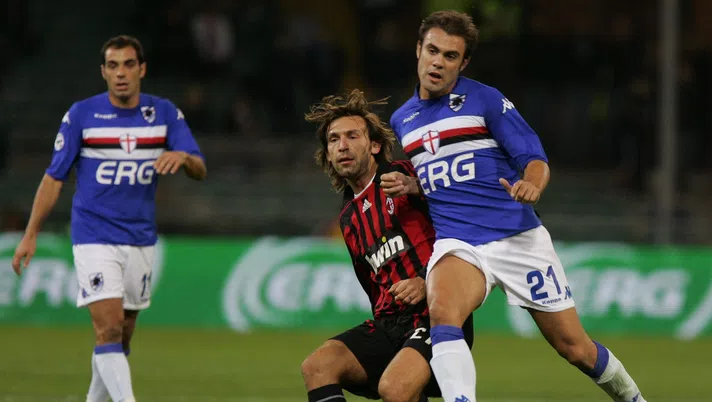 GENOA, ITALY - OCTOBER 31: Andrea Pirlo of AC Milan and Paolo Sammarco of Sampdoria (R) compete for the ball after scoring during the Serie A match between Sampdoria and AC Milan at the Stadio Comunale Luigi Ferraris on October 31, 2007 in Genoa, Italy. (Photo by New Press/Getty Images)