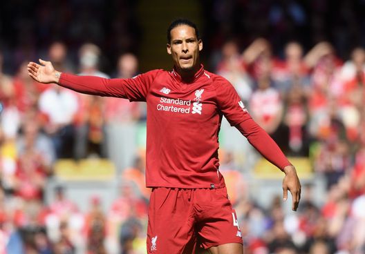 LIVERPOOL, ENGLAND - MAY 13: Virgil van Dijk of Liverpool in action during the Premier League match between Liverpool and Brighton and Hove Albion at Anfield on May 13, 2018 in Liverpool, England. (Photo by Michael Regan/Getty Images) LIVERPOOL, ENGLAND - MAY 13: Virgil van Dijk of Liverpool in action during the Premier League match between Liverpool and Brighton and Hove Albion at Anfield on May 13, 2018 in Liverpool, England. (Photo by Michael Regan/Getty Images)