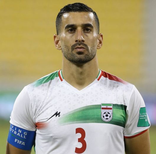 DOHA, QATAR - JUNE 12: Ehsan Hajsafi of Iran lines up ahead of the FIFA Friendly Regular Round match between Iran and Algeria at Suheim Bin Hamad Stadium on June 12, 2022 in Doha, Qatar. (Photo by Amir kheirkhah - ATPImages/Getty Images) Qatar 2022, Ehsan Hajsafi e l’Iran: “Dobbiamo prendere atto che nel nostro paese la gente è scontenta” - immagine 1