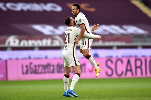 TURIN, ITALY - APRIL 18: Borja Mayoral of Roma celebrates with teammate Pedro after scoring their team's first goal during the Serie A match between Torino FC and AS Roma at Stadio Olimpico di Torino on April 18, 2021 in Turin, Italy. Sporting stadiums around Italy remain under strict restrictions due to the Coronavirus Pandemic as Government social distancing laws prohibit fans inside venues resulting in games being played behind closed doors. (Photo by Valerio Pennicino/Getty Images) TURIN, ITALY - APRIL 18: Borja Mayoral of Roma celebrates with teammate Pedro after scoring their team's first goal during the Serie A match between Torino FC and AS Roma at Stadio Olimpico di Torino on April 18, 2021 in Turin, Italy. Sporting stadiums around Italy remain under strict restrictions due to the Coronavirus Pandemic as Government social distancing laws prohibit fans inside venues resulting in games being played behind closed doors. (Photo by Valerio Pennicino/Getty Images)