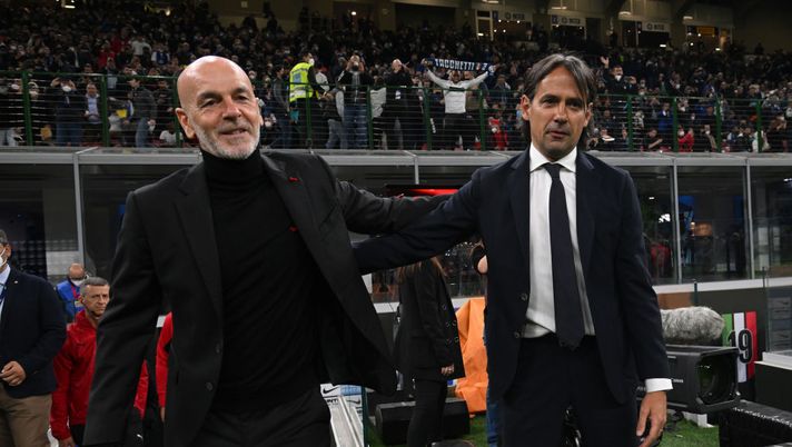 MILAN, ITALY - APRIL 19: Head coach of AC Milan Stefano Pioli
shakes hands with head coach of FC Internazionale Simone Inzaghi before the Coppa Italia Semi Final 2nd Leg match between FC Internazionale v AC Milan at Giuseppe Meazza Stadium on April 19, 2022 in Milan, Italy. (Photo by Claudio Villa/AC Milan via Getty Images) MILAN, ITALY - APRIL 19: Head coach of AC Milan Stefano Pioli
shakes hands with head coach of FC Internazionale Simone Inzaghi before the Coppa Italia Semi Final 2nd Leg match between FC Internazionale v AC Milan at Giuseppe Meazza Stadium on April 19, 2022 in Milan, Italy. (Photo by Claudio Villa/AC Milan via Getty Images)
