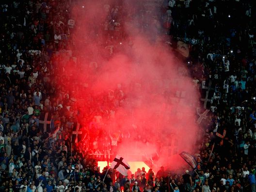NAPLES, ITALY - SEPTEMBER 26: Supporters of Napoli during the Serie A match between SSC Napoli and Juventus FC at Stadio San Paolo on September 26, 2015 in Naples, Italy.  (Photo by Maurizio Lagana/Getty Images) 