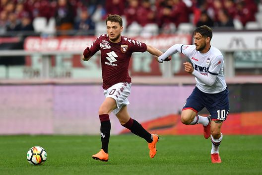 TURIN, ITALY - APRIL 04: Adem Ljajic (L) of Torino FC is challenged by Andrea Barberis of FC Crotone during the Serie A match between Torino FC and FC Crotone at Stadio Olimpico di Torino on April 4, 2018 in Turin, Italy. (Photo by Valerio Pennicino/Getty Images) TURIN, ITALY - APRIL 04: Adem Ljajic (L) of Torino FC is challenged by Andrea Barberis of FC Crotone during the Serie A match between Torino FC and FC Crotone at Stadio Olimpico di Torino on April 4, 2018 in Turin, Italy. (Photo by Valerio Pennicino/Getty Images)