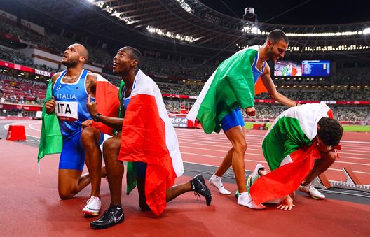 TOKYO, JAPAN - AUGUST 06: Lorenzo Patta of Italy, Lamont Marcell Jacobs of Italy, Eseosa Desalu of Italy and Filippo Tortu of Italy celebrates after winning gold in the Men's 4 x 100m Relay Final during Olympic Games Day 14 at Olympic Stadium on August 6, 2021 in Tokyo, Japan. (Photo by Aleksandra Szmigiel-Pool/Getty Images) TOKYO, JAPAN - AUGUST 06: Lorenzo Patta of Italy, Lamont Marcell Jacobs of Italy, Eseosa Desalu of Italy and Filippo Tortu of Italy celebrates after winning gold in the Men's 4 x 100m Relay Final during Olympic Games Day 14 at Olympic Stadium on August 6, 2021 in Tokyo, Japan. (Photo by Aleksandra Szmigiel-Pool/Getty Images)