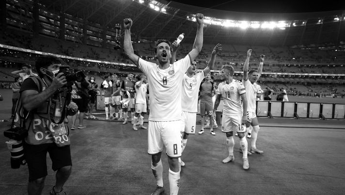 BAKU, AZERBAIJAN - JULY 03: (EDITORS NOTE - This image has been converted to black and white) Thomas Delaney of Denmark celebrates their side's victory after the UEFA Euro 2020 Championship Quarter-final match between Czech Republic and Denmark at Baku Olimpiya Stadionu on July 03, 2021 in Baku, Azerbaijan. (Photo by Naomi Baker/Getty Images) BAKU, AZERBAIJAN - JULY 03: (EDITORS NOTE - This image has been converted to black and white) Thomas Delaney of Denmark celebrates their side's victory after the UEFA Euro 2020 Championship Quarter-final match between Czech Republic and Denmark at Baku Olimpiya Stadionu on July 03, 2021 in Baku, Azerbaijan. (Photo by Naomi Baker/Getty Images)