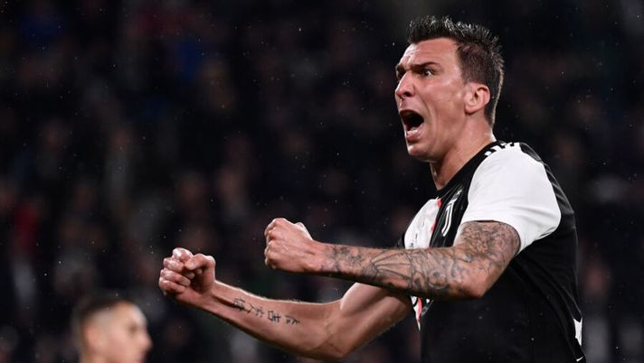 Juventus' Croatian forward Mario Mandzukic celebrates after scoring during the Italian Serie A football match Juventus vs Atalanta on May 19, 2019 at the Allianz stadium in Turin. (Photo by Marco Bertorello / AFP) (Photo credit should read MARCO BERTORELLO/AFP/Getty Images) MilanNews: “Mandzukic è a un passo dal Milan, accordo sempre più vicino” - immagine 1