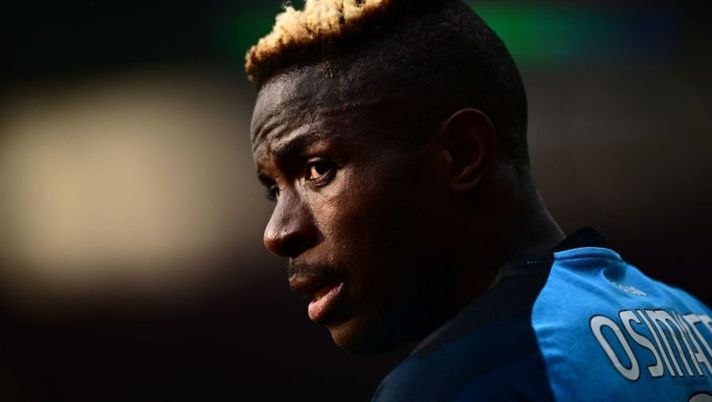 Napoli's Nigerian forward Victor Osimhen reacts during the Italian Serie A football match between Torino and Napoli on March 19, 2023 at the Olympic stadium in Turin. (Photo by Marco BERTORELLO / AFP) (Photo by MARCO BERTORELLO/AFP via Getty Images) Osimhen: “La scelta per il Milan in Champions, ne sono convinto: i tempi per l’infortunio” - immagine 1