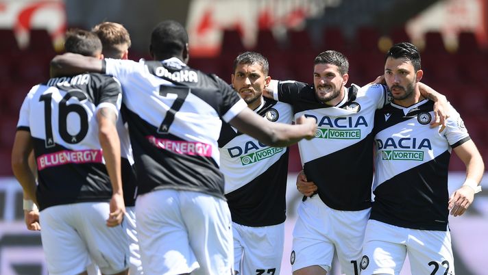 BENEVENTO, ITALY - APRIL 25: Jens Stryger Larsen of Udinese Calcio celebrates with Roberto Pereyra and Tolgay Arslan after scoring their side's third goal during the Serie A match between Benevento Calcio and Udinese Calcio at Stadio Ciro Vigorito on April 25, 2021 in Benevento, Italy. Sporting stadiums around Italy remain under strict restrictions due to the Coronavirus Pandemic as Government social distancing laws prohibit fans inside venues resulting in games being played behind closed doors. (Photo by Francesco Pecoraro/Getty Images) BENEVENTO, ITALY - APRIL 25: Jens Stryger Larsen of Udinese Calcio celebrates with Roberto Pereyra and Tolgay Arslan after scoring their side's third goal during the Serie A match between Benevento Calcio and Udinese Calcio at Stadio Ciro Vigorito on April 25, 2021 in Benevento, Italy. Sporting stadiums around Italy remain under strict restrictions due to the Coronavirus Pandemic as Government social distancing laws prohibit fans inside venues resulting in games being played behind closed doors. (Photo by Francesco Pecoraro/Getty Images)