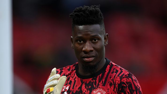 MANCHESTER, ENGLAND - AUGUST 14: André Onana of Manchester United warms up ahead of the Premier League match between Manchester United and Wolverhampton Wanderers at Old Trafford on August 14, 2023 in Manchester, England. (Photo by Gareth Copley/Getty Images)  Manchester United Fulham