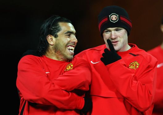 Rooney Tevez (getty images) Rooney Tevez