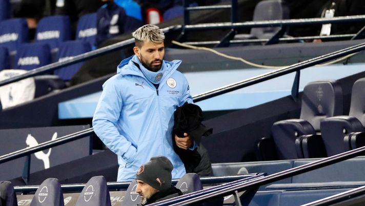MANCHESTER, ENGLAND - DECEMBER 15: Sergio Aguero of Manchester City looks on from the stands during the Premier League match between Manchester City and West Bromwich Albion at Etihad Stadium on December 15, 2020 in Manchester, England. The match will be played without fans, behind closed doors as a Covid-19 precaution. (Photo by Clive Brunskill/Getty Images) MANCHESTER, ENGLAND - DECEMBER 15: Sergio Aguero of Manchester City looks on from the stands during the Premier League match between Manchester City and West Bromwich Albion at Etihad Stadium on December 15, 2020 in Manchester, England. The match will be played without fans, behind closed doors as a Covid-19 precaution. (Photo by Clive Brunskill/Getty Images)
