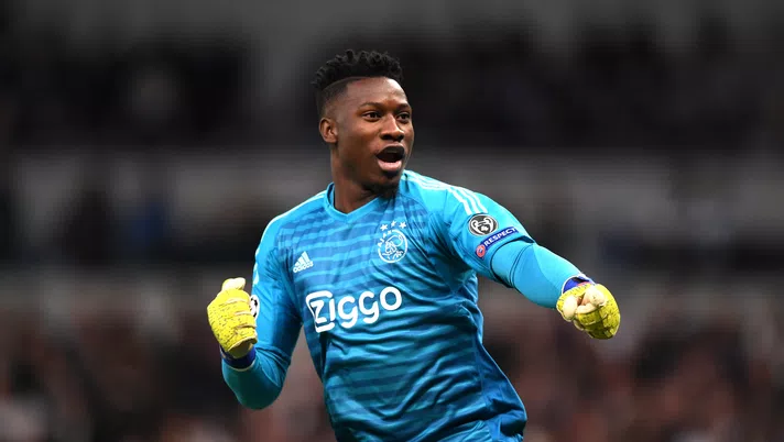 LONDON, ENGLAND - APRIL 30:  Andre Onana of Ajax celebrates as Donny van de Beek scores his team's first goal during the UEFA Champions League Semi Final first leg match between Tottenham Hotspur and Ajax at at the Tottenham Hotspur Stadium on April 30, 2019 in London, England. (Photo by Shaun Botterill/Getty Images)