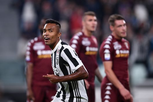  Juventus's defender from Brazil Alex Sandro celebrates after scoring during the Italian Serie A football match Juventus vs Torino at the Allianz Stadium in Turin on September 23, 2017. / AFP PHOTO / FILIPPO MONTEFORTE (Photo credit should read FILIPPO MONTEFORTE/AFP/Getty Images) 