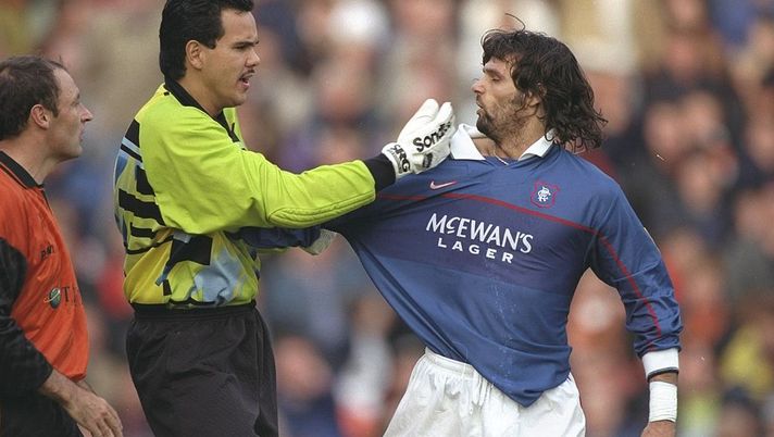 25 Oct 1997: Dundee Utd goalkeeper Sieb Dykstra (centre) confronts Marco Negri of Rangers during a Scottish Premier League match at Tannadice Park in Dundee, Scotland. Dundee United won the match 2-1. Mandatory Credit: Clive Brunskill/Allsport 25 Oct 1997: Dundee Utd goalkeeper Sieb Dykstra (centre) confronts Marco Negri of Rangers during a Scottish Premier League match at Tannadice Park in Dundee, Scotland. Dundee United won the match 2-1. Mandatory Credit: Clive Brunskill/Allsport