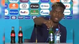Europei 2021 – Pogba come Ronaldo: toglie la birra dal tavolo | VIDEO
