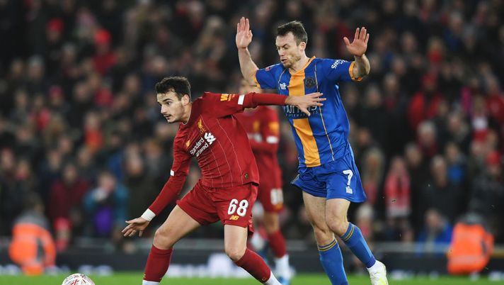 LIVERPOOL, ENGLAND - FEBRUARY 04: Pedro Chirivella of Liverpool is challenged by Shaun Whalley of Shrewsbury Town during the FA Cup Fourth Round Replay match between Liverpool FC and Shrewsbury Town at Anfield on February 04, 2020 in Liverpool, England. (Photo by Gareth Copley/Getty Images) LIVERPOOL, ENGLAND - FEBRUARY 04: Pedro Chirivella of Liverpool is challenged by Shaun Whalley of Shrewsbury Town during the FA Cup Fourth Round Replay match between Liverpool FC and Shrewsbury Town at Anfield on February 04, 2020 in Liverpool, England. (Photo by Gareth Copley/Getty Images)