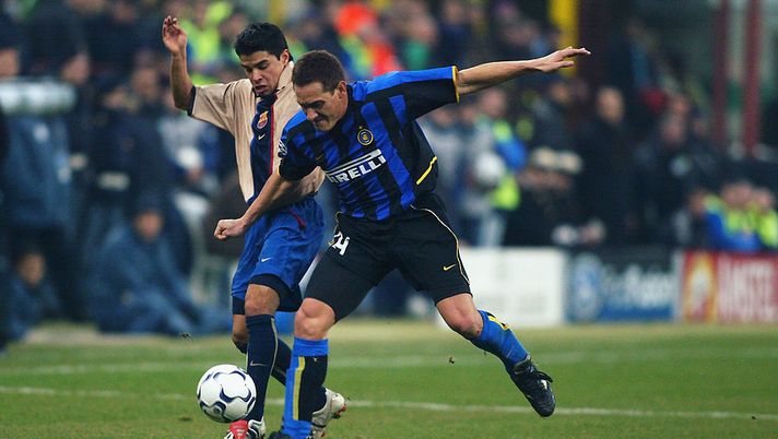 MILAN - FEBRUARY 26: Javier Saviola of Barcelona is tackled by Carlos Gamarra of Inter Milan during the UEFA Champions League Second Phase Group A match held on February 26, 2003 at the San Siro, in Milan, Italy. The match ended in a 0-0 draw. (Photo by Phil Cole/Getty Images) MILAN - FEBRUARY 26: Javier Saviola of Barcelona is tackled by Carlos Gamarra of Inter Milan during the UEFA Champions League Second Phase Group A match held on February 26, 2003 at the San Siro, in Milan, Italy. The match ended in a 0-0 draw. (Photo by Phil Cole/Getty Images)