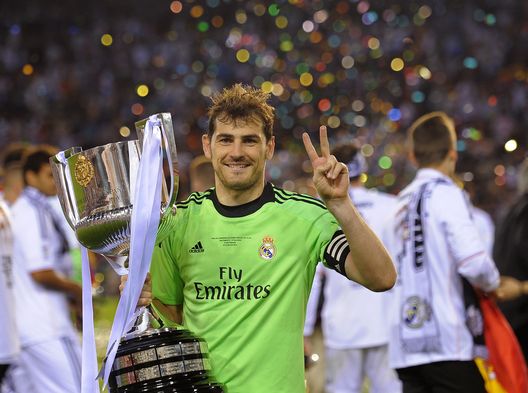 VALENCIA, SPAIN - APRIL 16: Iker Casillas of Real Madrid holds the Copa del Rey trophy after beating Barcelona in the Copa del Rey Final at Estadio Mestalla on April 16, 2014 in Valencia, Spain. (Photo by Denis Doyle/Getty Images) VALENCIA, SPAIN - APRIL 16: Iker Casillas of Real Madrid holds the Copa del Rey trophy after beating Barcelona in the Copa del Rey Final at Estadio Mestalla on April 16, 2014 in Valencia, Spain. (Photo by Denis Doyle/Getty Images)