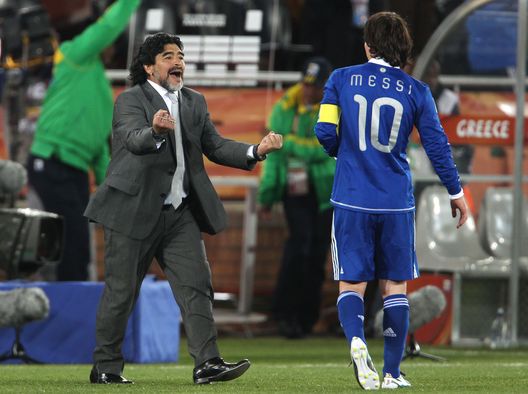 POLOKWANE, SOUTH AFRICA - JUNE 22: Diego Maradona head coach of Argentina celebrates victory with Lionel Messi during the 2010 FIFA World Cup South Africa Group B match between Greece and Argentina at Peter Mokaba Stadium on June 22, 2010 in Polokwane, South Africa. (Photo by Phil Cole/Getty Images) POLOKWANE, SOUTH AFRICA - JUNE 22: Diego Maradona head coach of Argentina celebrates victory with Lionel Messi during the 2010 FIFA World Cup South Africa Group B match between Greece and Argentina at Peter Mokaba Stadium on June 22, 2010 in Polokwane, South Africa. (Photo by Phil Cole/Getty Images)