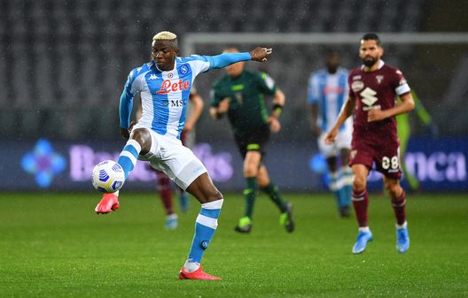 TURIN, ITALY - APRIL 26: Victor Osimhen of Napoli controls the ball during the Serie A match between Torino FC and SSC Napoli at Stadio Olimpico di Torino on April 26, 2021 in Turin, Italy. Sporting stadiums around Italy remain under strict restrictions due to the Coronavirus Pandemic as Government social distancing laws prohibit fans inside venues resulting in games being played behind closed doors. (Photo by Valerio Pennicino/Getty Images) TURIN, ITALY - APRIL 26: Victor Osimhen of Napoli controls the ball during the Serie A match between Torino FC and SSC Napoli at Stadio Olimpico di Torino on April 26, 2021 in Turin, Italy. Sporting stadiums around Italy remain under strict restrictions due to the Coronavirus Pandemic as Government social distancing laws prohibit fans inside venues resulting in games being played behind closed doors. (Photo by Valerio Pennicino/Getty Images)