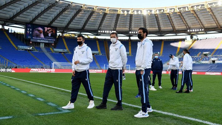 ROME, ITALY - MARCH 02: Danilo Cataldi, Senad Luic and Marco Parolo loock the pitch during the Serie A match between SS Lazio and Torino FC at Stadio Olimpico on March 02, 2021 in Rome, Italy. The match, despite it's not postponed by Lega Serie A, will not be played as Torino team need to observe a home quarantine until midnight on Tuesday due to Covd-19. (Photo by Marco Rosi - SS Lazio/Getty Images) ROME, ITALY - MARCH 02: Danilo Cataldi, Senad Luic and Marco Parolo loock the pitch during the Serie A match between SS Lazio and Torino FC at Stadio Olimpico on March 02, 2021 in Rome, Italy. The match, despite it's not postponed by Lega Serie A, will not be played as Torino team need to observe a home quarantine until midnight on Tuesday due to Covd-19. (Photo by Marco Rosi - SS Lazio/Getty Images)