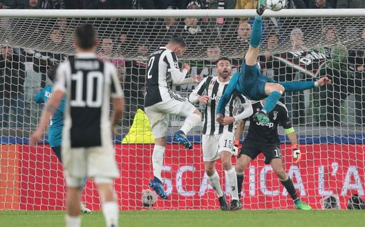 TURIN, ITALY - APRIL 03:  Cristiano Ronaldo of Real Madrid scores his sides second goal during the UEFA Champions League Quarter Final Leg One match between Juventus and Real Madrid at Allianz Stadium on April 3, 2018 in Turin, Italy.  (Photo by Emilio Andreoli/Getty Images) 