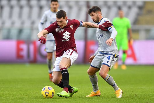 TURIN, ITALY - JANUARY 06: Andrea Belotti of Torino F.C. battles for possession with Miguel Veloso of Hellas Verona F.C. during the Serie A match between Torino FC and Hellas Verona FC at Stadio Olimpico di Torino on January 06, 2021 in Turin, Italy. Sporting stadiums around Italy remain under strict restrictions due to the Coronavirus Pandemic as Government social distancing laws prohibit fans inside venues resulting in games being played behind closed doors. (Photo by Valerio Pennicino/Getty Images) TURIN, ITALY - JANUARY 06: Andrea Belotti of Torino F.C. battles for possession with Miguel Veloso of Hellas Verona F.C. during the Serie A match between Torino FC and Hellas Verona FC at Stadio Olimpico di Torino on January 06, 2021 in Turin, Italy. Sporting stadiums around Italy remain under strict restrictions due to the Coronavirus Pandemic as Government social distancing laws prohibit fans inside venues resulting in games being played behind closed doors. (Photo by Valerio Pennicino/Getty Images)