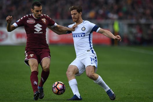 TURIN, ITALY - MARCH 18: Davide Zappacosta (L) of FC Torino is challenged by Cristian Ansaldi of FC Internazionale during the Serie A match between FC Torino and FC Internazionale at Stadio Olimpico di Torino on March 18, 2017 in Turin, Italy. (Photo by Valerio Pennicino/Getty Images) TURIN, ITALY - MARCH 18: Davide Zappacosta (L) of FC Torino is challenged by Cristian Ansaldi of FC Internazionale during the Serie A match between FC Torino and FC Internazionale at Stadio Olimpico di Torino on March 18, 2017 in Turin, Italy. (Photo by Valerio Pennicino/Getty Images)