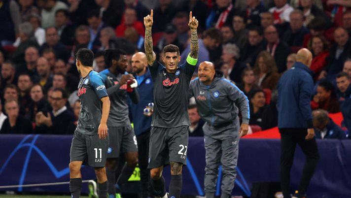 AMSTERDAM, NETHERLANDS - OCTOBER 04: Giovanni Di Lorenzo of SSC Napoli celebrates after scoring their team's second goal during the UEFA Champions League group A match between AFC Ajax and SSC Napoli at Johan Cruyff Arena on October 04, 2022 in Amsterdam, Netherlands. (Photo by Dean Mouhtaropoulos/Getty Images) di lorenzo