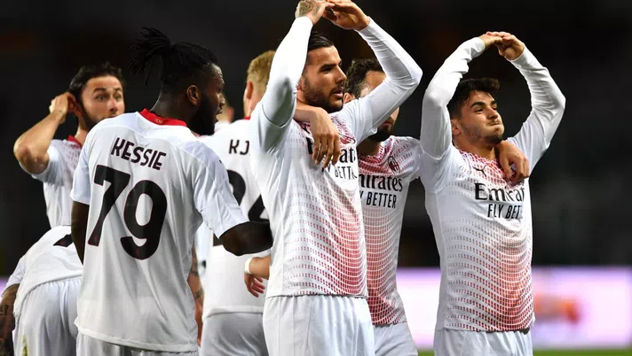 TURIN, ITALY - MAY 12: Theo Hernandez of A.C. Milan celebrates with team mates after scoring their side's first goal during the Serie A match between Torino FC  and AC Milan at Stadio Olimpico di Torino on May 12, 2021 in Turin, Italy. Sporting stadiums around Italy remain under strict restrictions due to the Coronavirus Pandemic as Government social distancing laws prohibit fans inside venues resulting in games being played behind closed doors. (Photo by Valerio Pennicino/Getty Images)