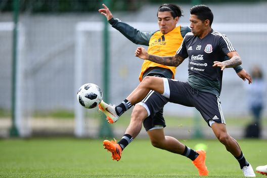MOSCOW, RUSSIA - JUNE 14: Erick Gutierrez and Javier Aquino of Mexico, struggles for the ball the ball during a training session at team training base Novogorsk-Dynamo on June 14, 2018 in Moscow, Russia. (Photo by Hector Vivas/Getty Images) MOSCOW, RUSSIA - JUNE 14: Erick Gutierrez and Javier Aquino of Mexico, struggles for the ball the ball during a training session at team training base Novogorsk-Dynamo on June 14, 2018 in Moscow, Russia. (Photo by Hector Vivas/Getty Images)