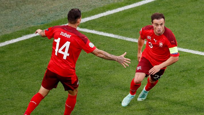 SAINT PETERSBURG, RUSSIA - JULY 02: Xherdan Shaqiri of Switzerland celebrates after scoring their side's first goal during the UEFA Euro 2020 Championship Quarter-final match between Switzerland and Spain at Saint Petersburg Stadium on July 02, 2021 in Saint Petersburg, Russia. (Photo by Anton Vaganov - Pool/Getty Images) SAINT PETERSBURG, RUSSIA - JULY 02: Xherdan Shaqiri of Switzerland celebrates after scoring their side's first goal during the UEFA Euro 2020 Championship Quarter-final match between Switzerland and Spain at Saint Petersburg Stadium on July 02, 2021 in Saint Petersburg, Russia. (Photo by Anton Vaganov - Pool/Getty Images)