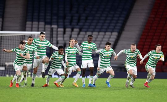 GLASGOW, SCOTLAND - DECEMBER 20: The Celtic team celebrate victory after a penalty shoot out in the William Hill Scottish Cup final match between Celtic and Heart of Midlothian at Hampden Park National Stadium on December 20, 2020 in Glasgow, Scotland. The match will be played without fans, behind closed doors as a Covid-19 precaution. Players of Hearts will wear the number 26 on their shorts as a tribute to Ex-Hearts player Marius Zaliukas who past away earlier in the week. (Photo by Ian MacNicol/Getty Images) GLASGOW, SCOTLAND - DECEMBER 20: The Celtic team celebrate victory after a penalty shoot out in the William Hill Scottish Cup final match between Celtic and Heart of Midlothian at Hampden Park National Stadium on December 20, 2020 in Glasgow, Scotland. The match will be played without fans, behind closed doors as a Covid-19 precaution. Players of Hearts will wear the number 26 on their shorts as a tribute to Ex-Hearts player Marius Zaliukas who past away earlier in the week. (Photo by Ian MacNicol/Getty Images)