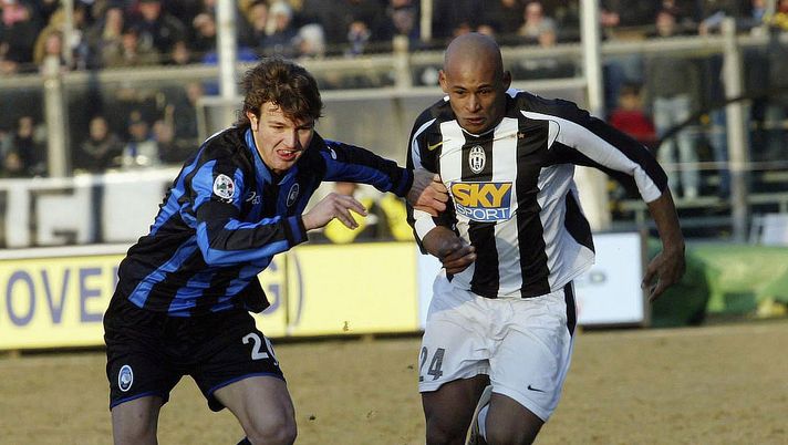 BERGAMO, ITALY - JANUARY 30: Marco Motta of Atalanta and Ruben Olivera (R) of Juventus in action during the Serie A match between Atalanta and Juventus at the Stadio Atleti Azzurri d'Italia on January 30, 2005 in Bergamo, Italy. (Photo by New Press/Getty Images) BERGAMO, ITALY - JANUARY 30: Marco Motta of Atalanta and Ruben Olivera (R) of Juventus in action during the Serie A match between Atalanta and Juventus at the Stadio Atleti Azzurri d'Italia on January 30, 2005 in Bergamo, Italy. (Photo by New Press/Getty Images)