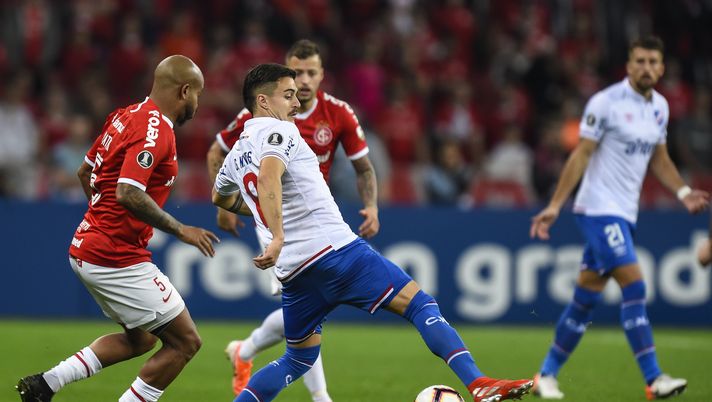 PORTO ALEGRE, BRAZIL - JULY 31: Patrick #5 of Internacional struggles for the ball with Gabriel Neves #8 of Nacional URU during a match between Internacional and Nacional URU as part of Copa CONMEBOL Libertadores 2019 at Beira-Rio Stadium on July 31, 2019 in Porto Alegre, Brazil. (Photo by Pedro Vilela/Getty Images) PORTO ALEGRE, BRAZIL - JULY 31: Patrick #5 of Internacional struggles for the ball with Gabriel Neves #8 of Nacional URU during a match between Internacional and Nacional URU as part of Copa CONMEBOL Libertadores 2019 at Beira-Rio Stadium on July 31, 2019 in Porto Alegre, Brazil. (Photo by Pedro Vilela/Getty Images)