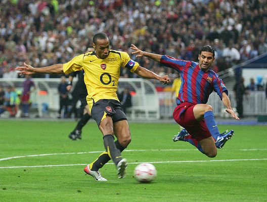 PARIS - MAY 17: Thierry Henry of Arsenal misses a chance as Rafael Marquez of Barcelona challenges during the UEFA Champions League Final between Arsenal and Barcelona at the Stade de France on May 17, 2006 in Paris, France. (Photo by Shaun Botterill/Getty Images) PARIS - MAY 17: Thierry Henry of Arsenal misses a chance as Rafael Marquez of Barcelona challenges during the UEFA Champions League Final between Arsenal and Barcelona at the Stade de France on May 17, 2006 in Paris, France. (Photo by Shaun Botterill/Getty Images)
