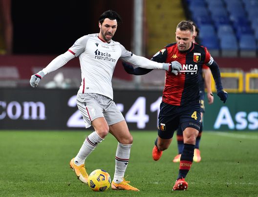 GENOA, ITALY JANUARY 09: Roberto Soriano of Bologna FC and Domenico Criscito of Genoa CFC compete for the ball during the Serie A match between Genoa CFC and Bologna FC at Stadio Luigi Ferraris on January 9, 2021 in Genoa, Italy. (Photo by Paolo Rattini/Getty Images) GENOA, ITALY JANUARY 09: Roberto Soriano of Bologna FC and Domenico Criscito of Genoa CFC compete for the ball during the Serie A match between Genoa CFC and Bologna FC at Stadio Luigi Ferraris on January 9, 2021 in Genoa, Italy. (Photo by Paolo Rattini/Getty Images)