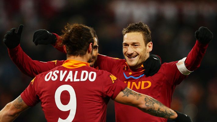 ROME, ITALY - DECEMBER 08: Pablo Daniel Osvaldo (L) of AS Roma celebrates with team-mate Francesco Totti after scoring his team's fourth goal during the Serie A match between AS Roma and ACF Fiorentina at Stadio Olimpico on December 8, 2012 in Rome, Italy. (Photo by Paolo Bruno/Getty Images) ROME, ITALY - DECEMBER 08: Pablo Daniel Osvaldo (L) of AS Roma celebrates with team-mate Francesco Totti after scoring his team's fourth goal during the Serie A match between AS Roma and ACF Fiorentina at Stadio Olimpico on December 8, 2012 in Rome, Italy. (Photo by Paolo Bruno/Getty Images)