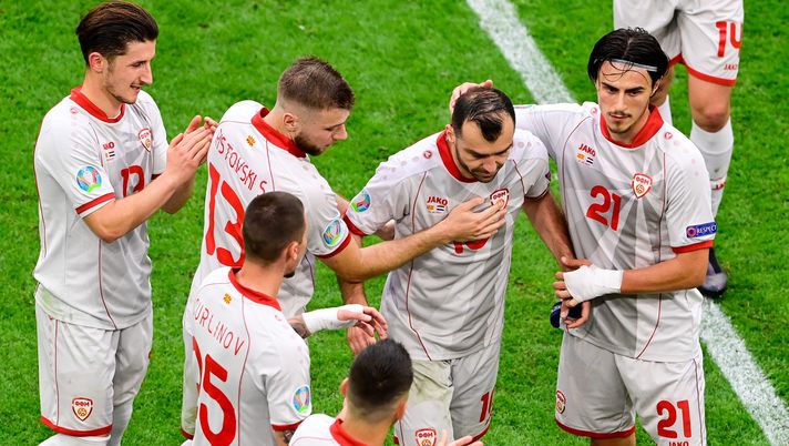 AMSTERDAM, NETHERLANDS - JUNE 21: Goran Pandev of North Macedonia is embraced by teammates Enis Bardi, Stefan Ristovski and Eljif Elmas as he is substituted off during the UEFA Euro 2020 Championship Group C match between North Macedonia and The Netherlands at Johan Cruijff Arena on June 21, 2021 in Amsterdam, Netherlands. (Photo by Olaf Kraak - Pool/Getty Images) AMSTERDAM, NETHERLANDS - JUNE 21: Goran Pandev of North Macedonia is embraced by teammates Enis Bardi, Stefan Ristovski and Eljif Elmas as he is substituted off during the UEFA Euro 2020 Championship Group C match between North Macedonia and The Netherlands at Johan Cruijff Arena on June 21, 2021 in Amsterdam, Netherlands. (Photo by Olaf Kraak - Pool/Getty Images)