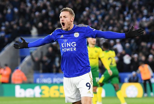 LEICESTER, ENGLAND - DECEMBER 14: Jamie Vardy of Leicester City celebrates after scoring his team's first goal during the Premier League match between Leicester City and Norwich City at The King Power Stadium on December 14, 2019 in Leicester, United Kingdom. (Photo by Ross Kinnaird/Getty Images) LEICESTER, ENGLAND - DECEMBER 14: Jamie Vardy of Leicester City celebrates after scoring his team's first goal during the Premier League match between Leicester City and Norwich City at The King Power Stadium on December 14, 2019 in Leicester, United Kingdom. (Photo by Ross Kinnaird/Getty Images)