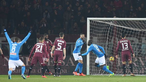 TURIN, ITALY - DECEMBER 16: Kalidou Koulibaly of SSC Napoli celebrates after scoring the 0-1 goal during the Serie A match between Torino FC and SSC Napoli at Stadio Olimpico di Torino on December 16, 2017 in Turin, Italy. (Photo by Francesco Pecoraro/Getty Images) TURIN, ITALY - DECEMBER 16: Kalidou Koulibaly of SSC Napoli celebrates after scoring the 0-1 goal during the Serie A match between Torino FC and SSC Napoli at Stadio Olimpico di Torino on December 16, 2017 in Turin, Italy. (Photo by Francesco Pecoraro/Getty Images)