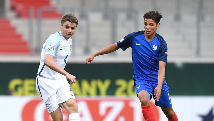 HEIDENHEIM, GERMANY - JULY 12: Jordan Rossiter of England (L) is challenged by Amine Harit of France during the UEFA Under19 European Championship match between U19 France and U19 England at Voith-Arena on July 12, 2016 in Heidenheim, Germany. (Photo by Daniel Kopatsch/Bongarts/Getty Images) 