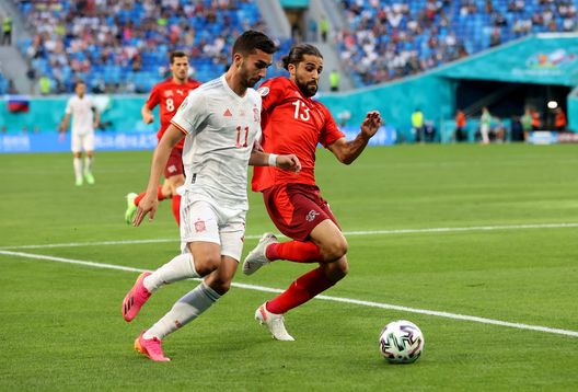  SAINT PETERSBURG, RUSSIA - JULY 02: Ferran Torres of Spain is challenged by Ricardo Rodriguez of Switzerland during the UEFA Euro 2020 Championship Quarter-final match between Switzerland and Spain at Saint Petersburg Stadium on July 02, 2021 in Saint Petersburg, Russia. (Photo by Alexander Hassenstein/Getty Images) 
