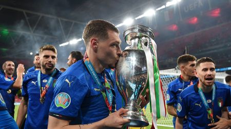 LONDON, ENGLAND - JULY 11: Andrea Belotti of Italy kisses The Henri Delaunay Trophy following his team's victory in the UEFA Euro 2020 Championship Final between Italy and England at Wembley Stadium on July 11, 2021 in London, England. (Photo by Andy Rain - Pool/Getty Images) LONDON, ENGLAND - JULY 11: Andrea Belotti of Italy kisses The Henri Delaunay Trophy following his team's victory in the UEFA Euro 2020 Championship Final between Italy and England at Wembley Stadium on July 11, 2021 in London, England. (Photo by Andy Rain - Pool/Getty Images)